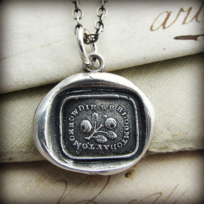 Bloom Today wax seal necklace.