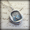 Cocoon & butterfly wax seal necklace on old english script.