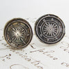 Compass Wax Seal earrings on old english script