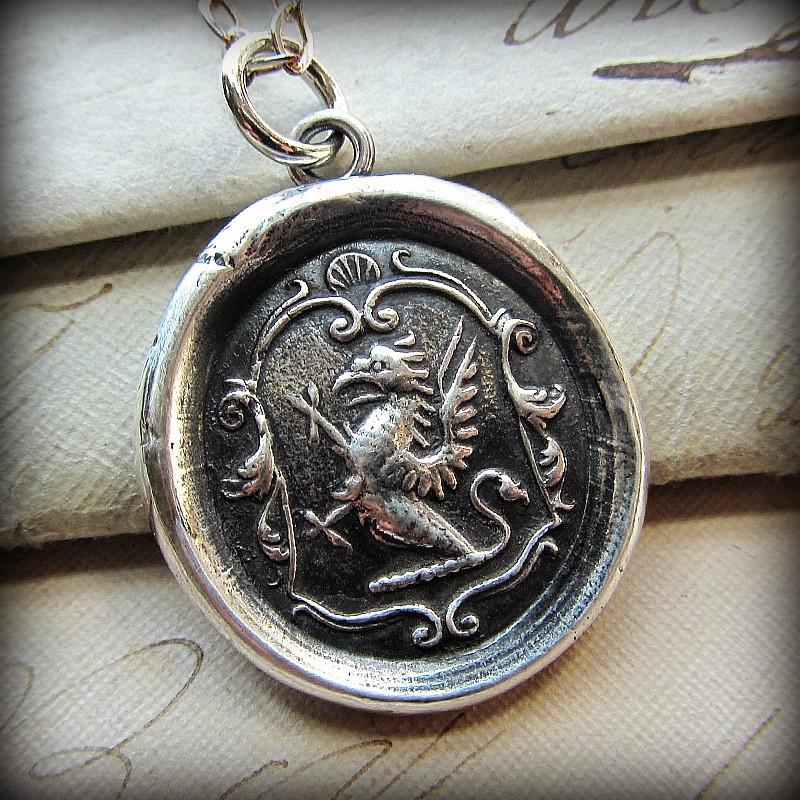 Griffin wax seal crest expressing courage, perseverance & watchfulness.
