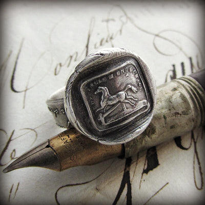 Horse Wax Seal Ring on a fine tipped antique pen.