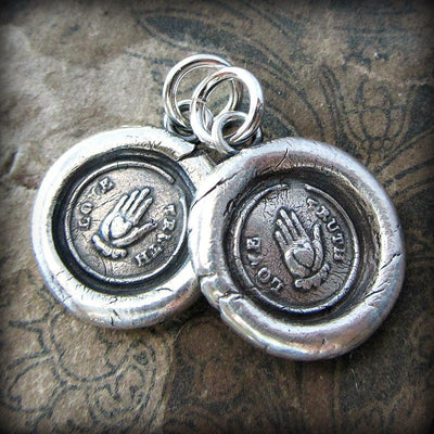 Two love truth victorian wax seal necklaces attached at the top