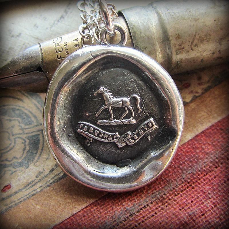 Horse Wax Seal Crest Necklace on antique fine tipped pen.