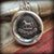 Horse Wax Seal Crest Necklace on antique fine tipped pen.